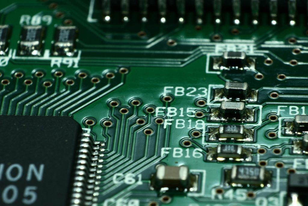 Extreme closeup of Green Computer Circuit Board
