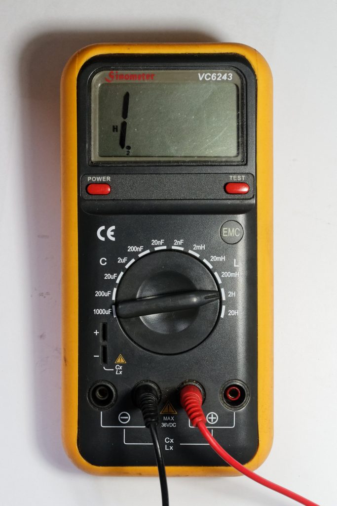 Closeup of yellow digital LCR meter